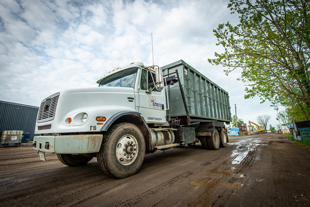We are equipped with several roll-off and day cab tractors if your project requires scrap containers.