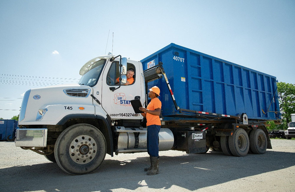 Photo of one of the many collection vehicles used by Upstate.